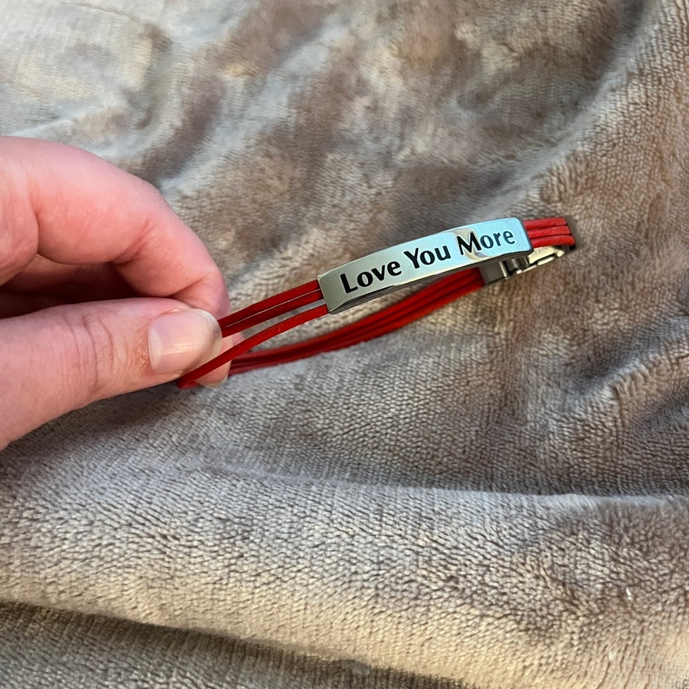 Red Bracelet with 'Love You More' Engraving